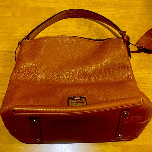 Dooney & Bourke Handbags - Authentic Dooney and Bourke all weather leather shoulder bag. Great condition.